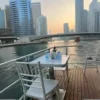 dhow-cruise-dubai-marina-buffet-dinner-seating.webp VIP Economy Eid Cruise Marina Deal in Dubai 2026 - Royal Dhow Cruise