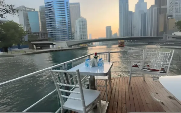 dhow-cruise-dubai-marina-buffet-dinner-seating.webp VIP Economy Eid Cruise Marina Deal in Dubai 2026 - Royal Dhow Cruise