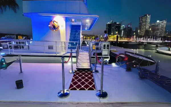 dhow-cruise-dubai-marina-night-views-bluewaters-ain-dubai.webp VIP Economy Eid Cruise Marina Deal in Dubai 2026 - Royal Dhow Cruise