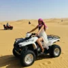 dubai-desert-quad-biking-woman.webp Morning Desert Safari With Quad Bike